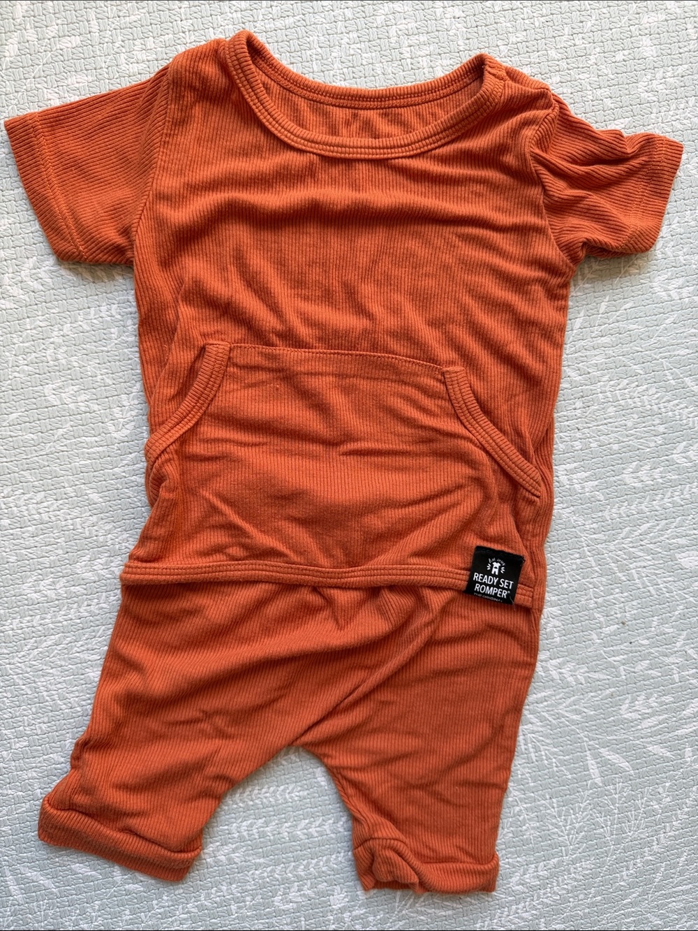 Ready Set Romper Rust Ribbed Short Sleeve Romper – 0–6M
